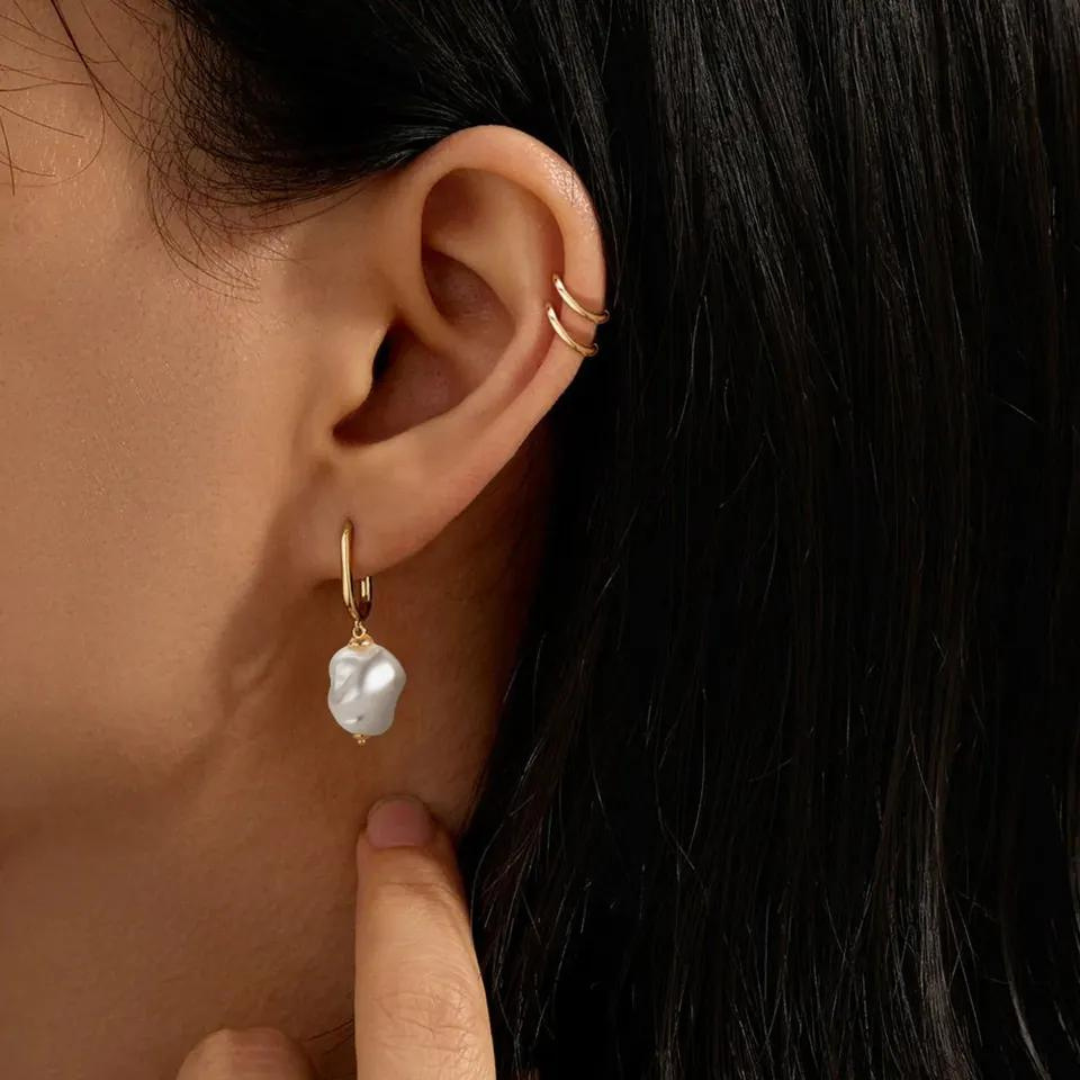 Elegant gold-plated pearl drop earrings, crafted with real S925 silver, adding a touch of sophistication to any outfit.